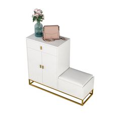 a white cabinet with drawers and a pink purse on top