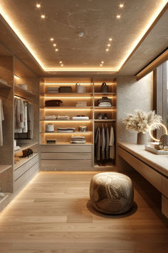 a large walk in closet with lights on the ceiling