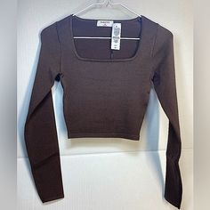 Babaton Sculpt Knit Squareneck Longsleeve Top (Rich Mocha Brown) -> This Is A Fully Fashioned Square-Neck Longsleeve. It's Constructed With A Jersey Stitch For A Soft Drape And A Smooth, Flat Feel. It's Made With Sculpt Knit Babaton’s Signature Figure-Smoothing Yarn -> Fit: Tight A Close Fit That Hugs The Body Length: Cropped Intended To Hit Around The Ribcage Fitted Knit Crop Top With Long Sleeve, Fitted Long Sleeve Knit Crop Top, Fitted Knit Long Sleeve Crop Top, Fitted Long Sleeve Knit Sweater, Fitted Knit Long Sleeve Sweater, Fitted Fine Knit Long Sleeve Top, Fitted Brown Knit Crop Top, Fitted Long Sleeve Knit Top, Brown Fitted Knit Crop Top