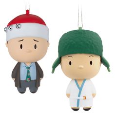 two christmas ornament shaped like the characters of south park, one with a green hat and tie