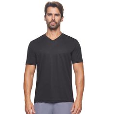 Our best-selling Oxymesh™ fabric has a non-see-through athletic mesh exterior, is lightweight and feels fresh against your body. Built-in odor control and sweat-wicking technology keeps you fresh and dry naturally, WITHOUT the use of PFAS chemical applications used in most performance clothing. Highlights: Features a relaxed fit, v-neck, a clean silhouette, and an easy tear-away tag. This shirt is longer-lasting, air-dries in 30 minutes and will immediately become one of your favorites. RELIABLE Athletic Top, Athletic Shirts, Hem Style, Black Xs, Performance Outfit, Casual Fits, Black Tank Tops, Lightweight Hoodie, Men Short Sleeve