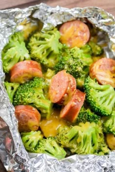 sausage and broccoli wrapped in tin foil