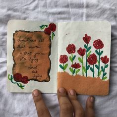 a hand is holding an open book with flowers on it and the words sometimes all that matters to the young