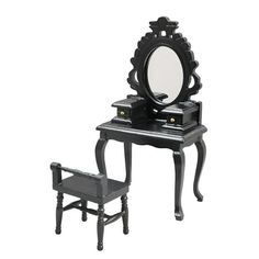 an antique vanity with mirror and stool