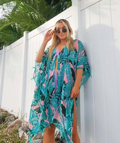 The ultimate tropical beach cover up for vacays and beach days, this cute swim cover up dress with tassel trim features a dreamy pink and green monstera leaf palm print. One size fit most. Hand wash & hang dry only Material: 100% Viscose Beachy Tropical Print Cover-up For Beach, Green Cover-up For Beach Party Vacation, Green Summer Swimwear With Palm Tree Print, Green Palm Tree Print Summer Swimwear, Spring Tropical Print Cover-up For Poolside, Beachy Green Cover-up With Tropical Print, Summer V-neck Cover-up With Tropical Print, Green Floral Print Summer Cover-up, Green Palm Tree Print Swimwear For Beach Season