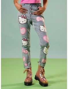 Keep your look kawaii with Hello Kitty! These Sanrio mom jeans feature prints of Hello Kitty's face, hearts and her signature bow printed down both legs. Her name is also on the back pocket. Comes with exposed pink heart-shaped buttons and cuffed ankles. Hello Kitty Hearts, Pop Culture Fashion, Hello Kitty Shoes, Kitty Clothes, Hello Kitty Clothes, Shoes Outfit Fashion, Tall Hoodies, Mommy Style, Hello Kitty Collection