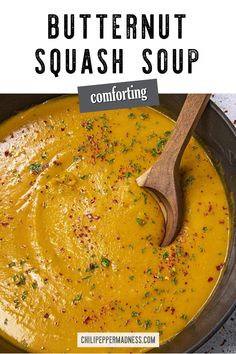 a bowl of butternut squash soup with a wooden spoon in it and text overlay that reads, butternut squash soup comforting