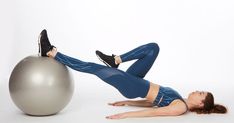 a woman is doing exercises on an exercise ball