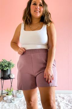 Take your cute and cozy feels up a level with these henley high waisted sweat shorts. These loungewear bottoms feature an elastic waistband which makes them ultra cozy but structured enough where you will want to style them to be worn at home and beyond! 

Details:

Elastic waistband
Functional pockets
Finished with clean hem
Slits on side seam Comfortable Everyday Pajama Shorts, Elastic Waistband Knee-length Loungewear Shorts, Knee-length Loungewear Shorts With Elastic Waistband, Everyday Pajama Shorts With Elastic Waistband, Comfy Pajama Shorts With Built-in Shorts, Casual High-waisted Pajama Shorts For Loungewear, Everyday Pajama Shorts, Cozy Lounging Shorts, Cozy Pajama Shorts With Elastic Waistband