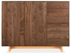 the sideboard is made from wood and has five drawers, two doors and one drawer