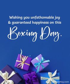 purple and blue boxes with bows on them saying wishing you unfathomable joy & guarded happiness on this boxing day