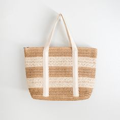 In Stock! Fast Shipping from Los Angeles! Soar to new fashion heights with Elena's Handbags Straw Woven Beach Tote! Large enough to accommodate all your essentials - and some - this bold and beautiful tote is perfect for beach days, poolside lounging, and making a strong style statement. Take a risk and go for the wow! Size: 35cm wide x 30cm tall (14in x 12in) Zipper Closure Designer Style ID: 8360 Large Straw Woven Tote Bag, Summer Bag, Everyday Shoulder Bag, Beach Bag Trendy White Beach Bag With Braided Handles, Woven Tote Bag For Beach Season, Double Handle Bags For Beach Vacation, Double Handle Bags For Beach Season Vacation, Beach Season Woven Tote Bag, Beach Season Vacation Bags With Double Handle, Double Handle Beach Vacation Bags, Large Capacity Summer Beach Tote Bag, White Crochet Bag For Beach Travel