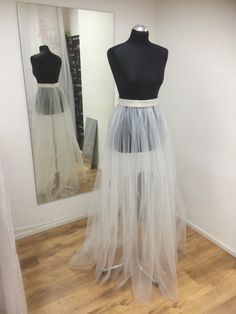 Long tulle skirt for wedding dress. Feminine touch for your wedding day.  Other colors available in listing:  https://www.etsy.com/listing/248828084/bridal-tulle-long-sheer-skirt-tutu?ref=shop_home_feat_3 Sheer on front and less sheer on sides and bottom. * Not lined - they are supposed to wear on dress, you can make simple dress your wedding dress only with these skirts. * satin waistband, 1.5" or 4cm waistband by default. Can be made shiny or matte by request, can also be made wider or thinner Floor-length Tulle Wedding Dress With Sheer Bodice, White Tulle Long Skirt Dress, White Long Tulle Skirt Dress, White Long Tulle Dress, Fitted Tulle Wedding Dress With Tulle Skirt, Long Tulle Wedding Skirt, Long Tulle Skirt For Wedding, Fitted Floor-length Tulle Wedding Dress, Wedding Petticoat With Flowy Tulle Skirt