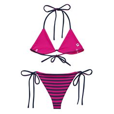 Indulge in the luxurious and classic style of our navy blue and medium violet red beach stripes string bikini. This sweet swimsuit set is not only comfortable, but it also offers double-layering and UPF 50+ protection. Customize the straps to your liking and get ready to turn heads at the beach! Made from soft recycled polyester, this bikini is both stylish and sustainable. • Soft and stretchy material with UPF 50+ • Sizes up to 6XL • Bikini top comes with removable padding for comfort • Multipl Adjustable Striped Swimwear For Summer, Striped Triangle Top Swimwear For Beach, Adjustable Striped Swimwear For Poolside, Beachy Striped Tie-side Swimwear, Striped Tie-side Bottom Swimwear For Beach, Adjustable Striped Beachwear Swimwear, Nautical Swimwear For Beach Season, Nautical Swimwear For Beach Season And Poolside, Nautical Swimwear For Poolside And Beach Season