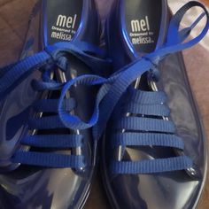 Mel Dreamed By Melissa Blue Rubber Kids Sneakers 12 New Never Worn Comfortable Blue Lace-up Sneakers, Blue Flat Sneakers For Sports, Blue Sporty Flat Sneakers, Blue Flat Sneakers With Laces, Blue Flat Synthetic Sneakers, Blue Synthetic Sneakers With Vulcanized Sole, Blue Vulcanized Sole Flat Sneakers, Sporty Blue Flat Sneakers, Comfortable Blue Sneakers With Laces