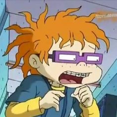 an animated image of a boy with glasses brushing his teeth and looking at the camera