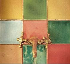 a faucet with water running from it in front of colorful tiles