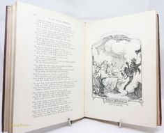 an open book with drawings on it