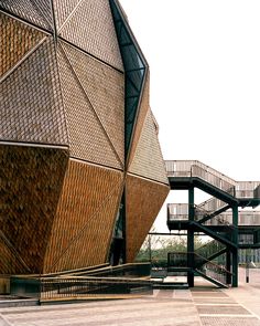 an unusual building with multiple levels and stairs