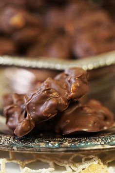 two pieces of chocolate covered cookies on a plate