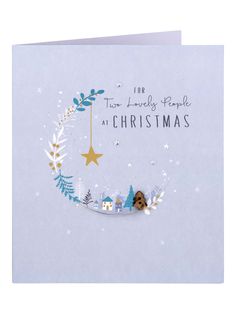 a christmas card with a dog on the moon and stars hanging from it's side