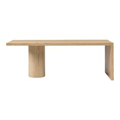 a wooden table sitting on top of a white floor