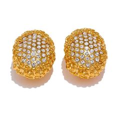 Introducing the Gold Gleam Ear Clips, an exquisite fusion of style and comfort. These statement earrings are crafted from hypoallergenic stainless steel with a radiant 18k gold finish, ensuring durability and shine. Adorned with sparkling cubic zirconia, they add a touch of glamour to any ensemble. Their innovative push-back clip design not only ensures a secure fit but also prevents allergies, making them suitable for all-day wear. Elevate your look with these versatile earrings, perfect for bo Gold Clip-on Diamond Earrings, Gold Diamond Clip-on Earrings, Luxury Clip-on Earrings With Cubic Zirconia, Gold Diamond Clip-on Earrings For Evening, Gold Diamond Cluster Earrings For Party, Gold Clip-on Cubic Zirconia Earrings, Gold Cluster Earrings With Sparkling Stones For Formal Events, Elegant Gold Clip-on Earrings With Sparkling Stones, Clip Design