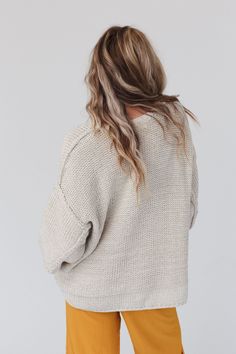 Snuggle up in a chunky boho sweater like the Crisp Air pullover. Thick, seam detailing and a fun double - hem has a bit of open - stitch detail at the notches in the sides. This modern, boxy - fit has wide cuffs and comfy Dolman - style sleeves. Pair with: Evermore Seamless Lace Racerback Bralette, Washed Ashore Ruffled Maxi Skirt and Dreamscape Layered Necklace. *Due to lighting and differences in monitors, actual colors may vary slightly from what appears online. Model is 5'8" and wearing a si Cozy Textured Knit Cropped Sweater For Loungewear, Beige Soft Knit Cropped Sweater, Beige Cropped Soft Knit Sweater, Cozy Slouchy Cropped Sweater, Fall Beige Cropped Sweater In Soft Knit, Beige Soft Knit Cropped Sweater For Fall, Cozy Slouchy Textured Knit Sweater, Soft Knit Cropped Sweater For Fall In Beige, Fall Soft Knit Cropped Sweater In Beige