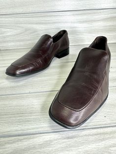 Smooth and sleek luxury dress shoes slip on loafers by Too Boot New York. Brown, in excellent, gently used condition. Luxury Calf Leather Slip-on Men's Shoes, Luxury Men's Slip-on Calf Leather Shoes, Luxury Slip-on Men's Shoes With Pointed Toe, Luxury Alligator Leather Slip-on Dress Shoes, Luxury Brown Slip-on Loafers, Luxury Dress, Leather Slip Ons, Sleek, Brown Leather