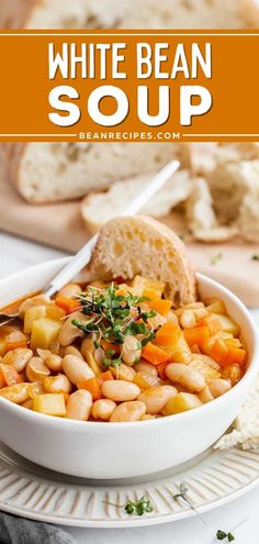 white bean soup in a bowl with bread on the side and text overlay that reads, white bean soup