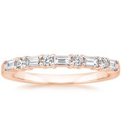 a rose gold wedding band with baguetts