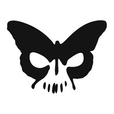 a black and white image of a butterfly skull