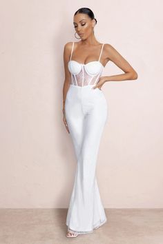 Carefully designed for special events, our must-have ‘’First Look’’ jumpsuit will keep you looking effortlessly gorgeous at any event this season. With glamorous neckline, delicate cami straps and on-trend corset bodice design for a curve contouring look. Its flared trousers will create the illusion of timeless legs and the chic lace material oozes elegance and sophistication. This style is perfect for the reception look, its stretchy fabric will keep you comfortable from dusk till dawn. Modern elegance at its finest.  Features  - Cami straps  - Moulded cups  - Corset bodice  - Flared trousers  - Lace fabric    Sizing & Fit Model is 5’8 and wears UK size 8 / US size 4   Product Information   Fully lined and with a good amount of stretch Lace and slinky fabric (100% Polyester) Inside le From Dusk Till Dawn, Reception Look, Velvet Prom Dress, Bridal Bachelorette Party, Pregnant Wedding, Wedding Shoes Bride, Black Dress Prom, Dusk Till Dawn, Black Tie Gala