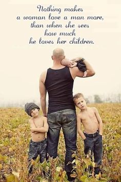 a man and two boys standing in a field with the words nothing makes a woman love a man more than seeing how much he loves their children