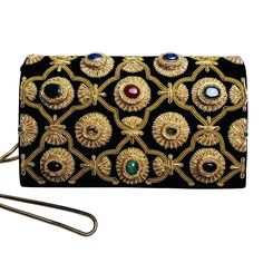 Stunning in its opulence! Heavily embroidered with glittery gold accents and embellished with large gemstone cabochons, there is nothing like it to make a grand entrance! Gemstones include jade, amethyst, smoky topaz, agate, green onyx, lapis lazuli. DETAILS: Top flap with magnetic closure Gold tone hardware One interior compartment Two interior slit pockets Dust bag included Satin lining Genuine semi precious stones, sewn in SIZE: 8" W x 5" H x 2.5" D 20.3 x 14 x 6.4 cm Detachable snake chain s Modern Clutch, Bridal Clutch Bag, Embroidered Handbag, Floral Handbags, Floral Clutches, Smoky Topaz, Velvet Clutch, Bridal Clutch, Crazy Things