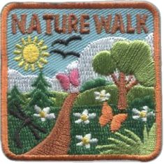 a patch with the words nature walk on it and butterflies flying over trees, flowers, and grass