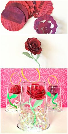 paper flowers are in vases on the table and one is cut out to look like roses