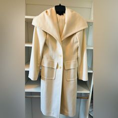 This Is A Classic Coat. You Can Dress It Up Or Down But It’s A Forever Winter White Beautiful Look. Barely Worn, And Bcbg Vintage. It’s A Size Small. Winter White Long-sleeved Outerwear With Buttons, Ecru Wool Coat Under $100, Classic Coats, Winter White, Wool Coat, Jackets & Coats, Jackets For Women, Wool, White