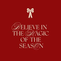 believe in the magic of the season on a red background with white lettering and a bow