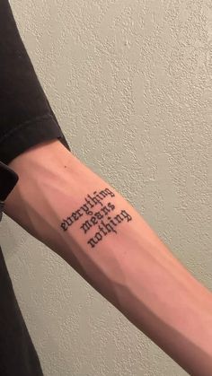 a person with a tattoo on their arm that says, there is no place for me to