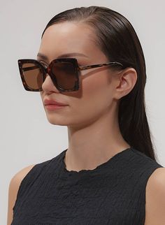 OVERSIZED SQUARED SUNGLASSES IN BROWN TORTOISESHELL PRODUCT DETAILS Frame: Oversized Squared Color: Tortoiseshell Lens: Brown #CAT3 100% UV Protection Comes with a Soft Cream Vegan Case SIZE CM INCHES FRAME WIDTH 14.5 CM 5.7" FRAME HEIGHT 5.9 CM 2.3" LENS WIDTH 5.6 CM 2.2" LENS HEIGHT 4.8 CM 1.9" Chic Sunglasses With Mirrored Lenses For Square Face, Chic Mirrored Sunglasses For Square Face, Chic Square Face Sunglasses With Mirrored Lenses, Chic Sunglasses With Uv Protection For Square Face, Chic Sunglasses With Tinted Lenses For Square Face, Chic Tinted Sunglasses For Square Face, Chic Square Sunglasses For Party, Trendy Rectangular Cat Eye Sunglasses For Summer, Chic Rectangular Sunglasses With Mirrored Lenses