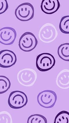 a purple background with smiley faces on it