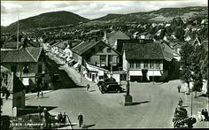 an old black and white photo of a town