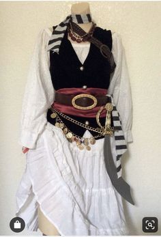 a pirate costume is displayed on a mannequin