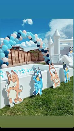 some cartoon characters are standing in front of a pool with blue and white balloons on it