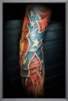 an american flag tattoo with stars and stripes on the arm, done by person at red white and blue ink