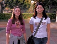 two young women standing next to each other