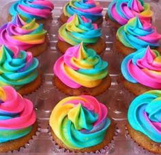 cupcakes with colorful frosting in a plastic container