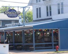 the front of an adrias inn with many items on display