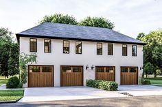 two story white house with brown garage doors